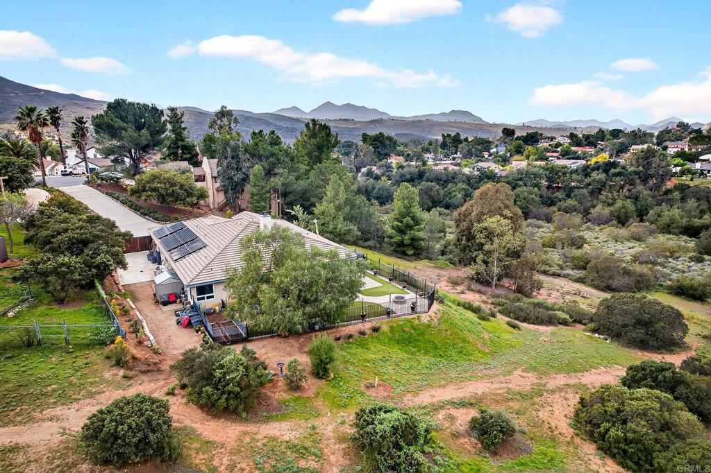 15953 Shalom Road Ramona, CA 92065 - Photo 60 of 71 an aerial view of residential houses with outdoor space and trees
