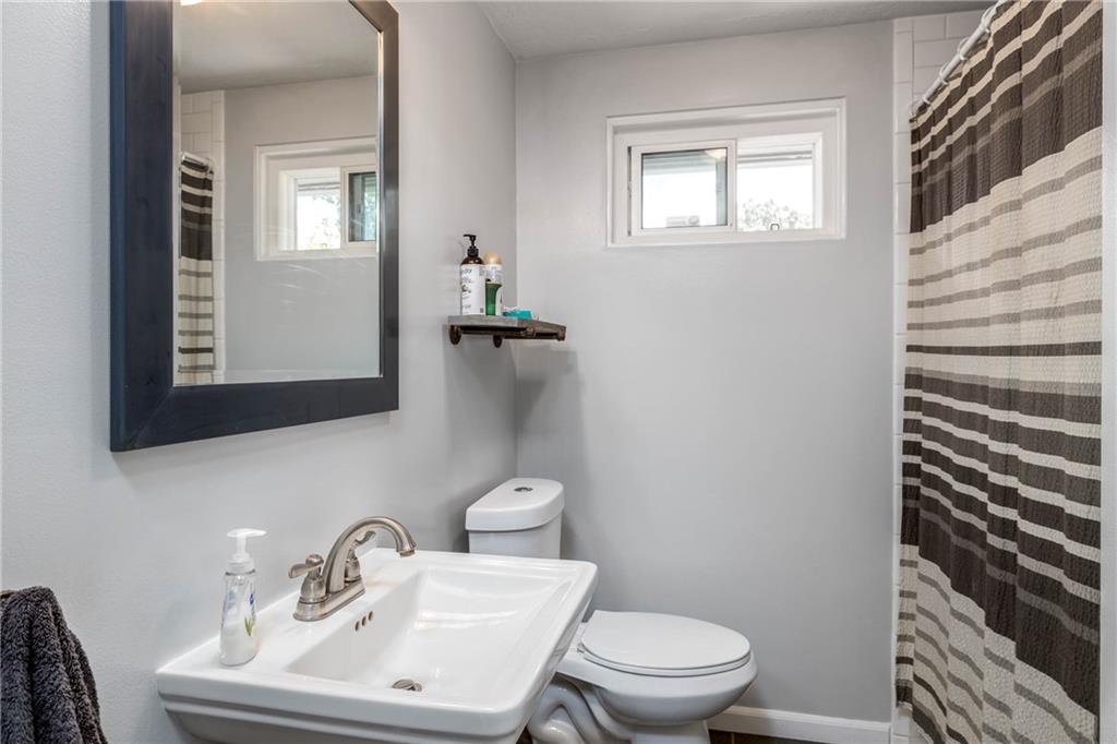 1420 Reissing Road McDonald, PA 15057 - Photo 16 of 33 The main bathroom is of minimalist design with its soft tones and simple design.