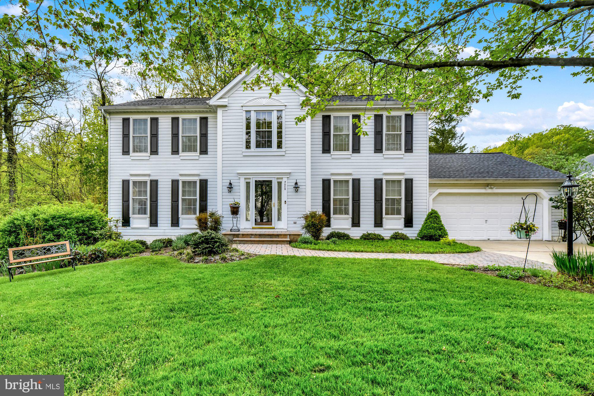 4 Boulder Brook Court Baltimore, MD 21209 - Photo 1 of 49 a front view of a house with a yard
