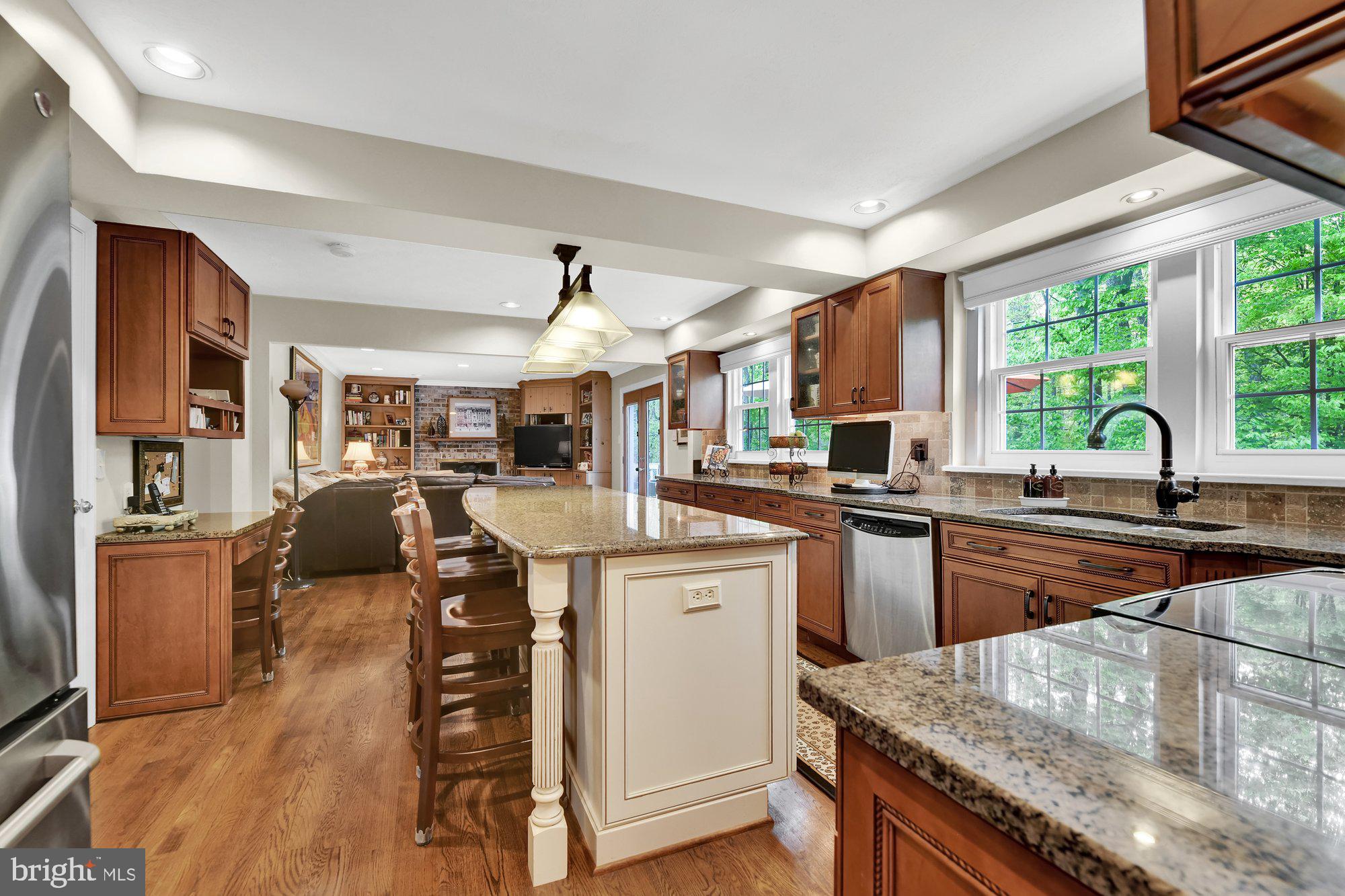4 Boulder Brook Court Baltimore, MD 21209 - Photo 12 of 49 a kitchen with stainless steel appliances granite countertop sink stove and refrigerator