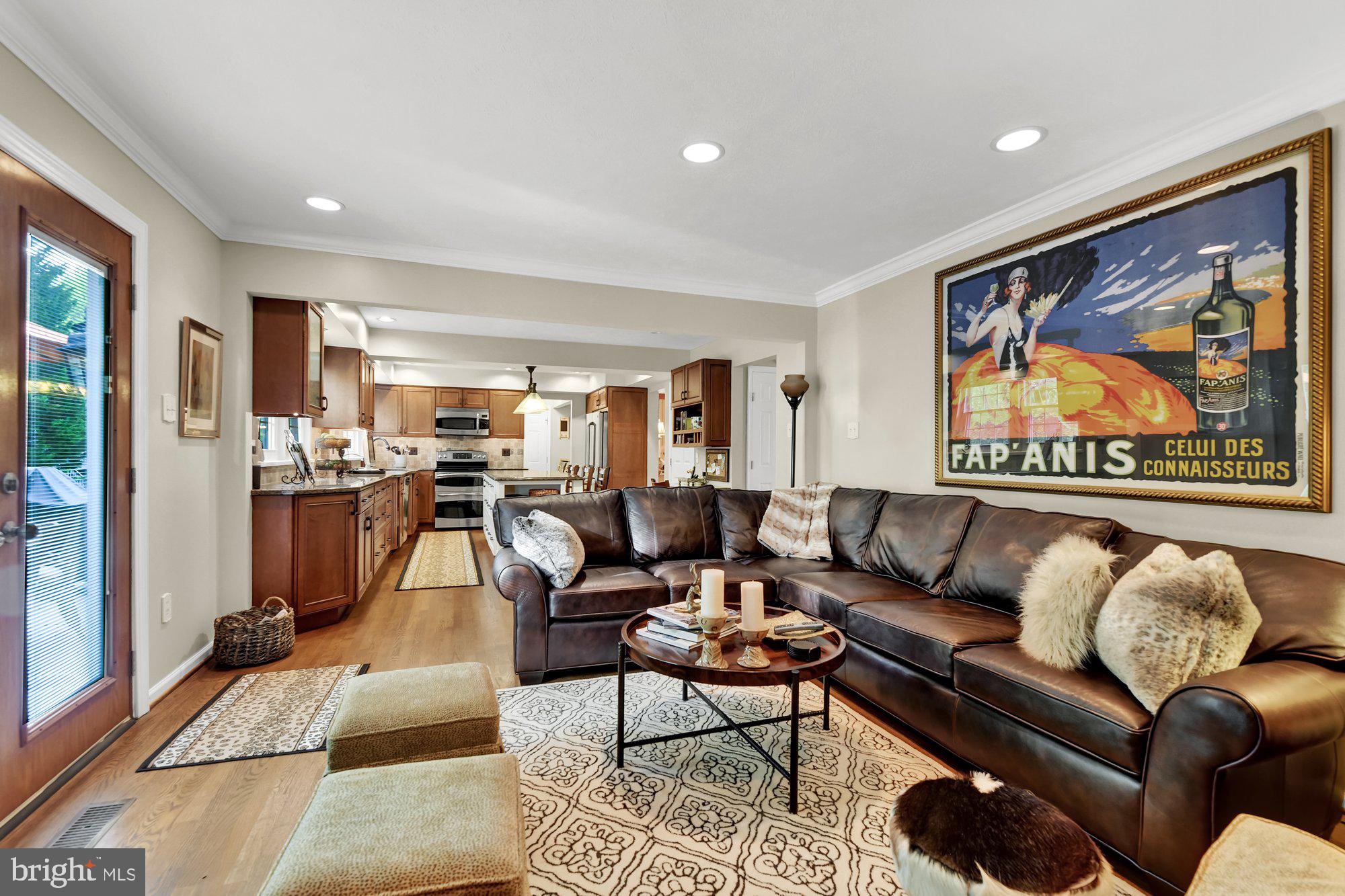 4 Boulder Brook Court Baltimore, MD 21209 - Photo 13 of 49 a living room with furniture kitchen view and a large window