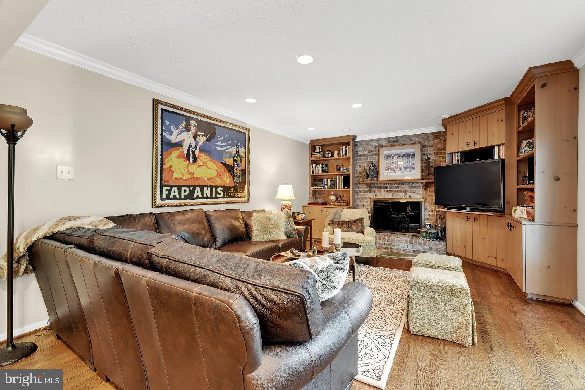 4 Boulder Brook Court Baltimore, MD 21209 - Photo 15 of 49 a living room with furniture fireplace and flat screen tv