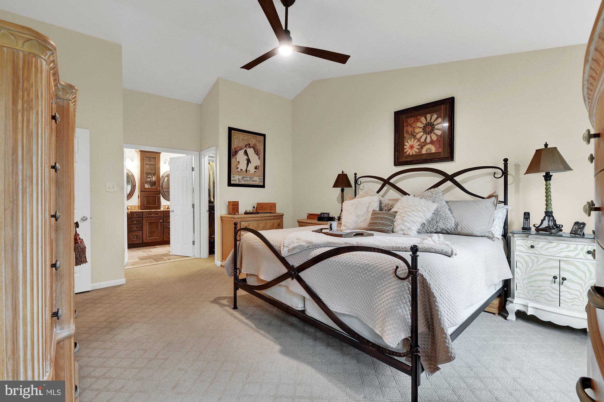 4 Boulder Brook Court Baltimore, MD 21209 - Photo 19 of 49 a bedroom with bed and white cabinets