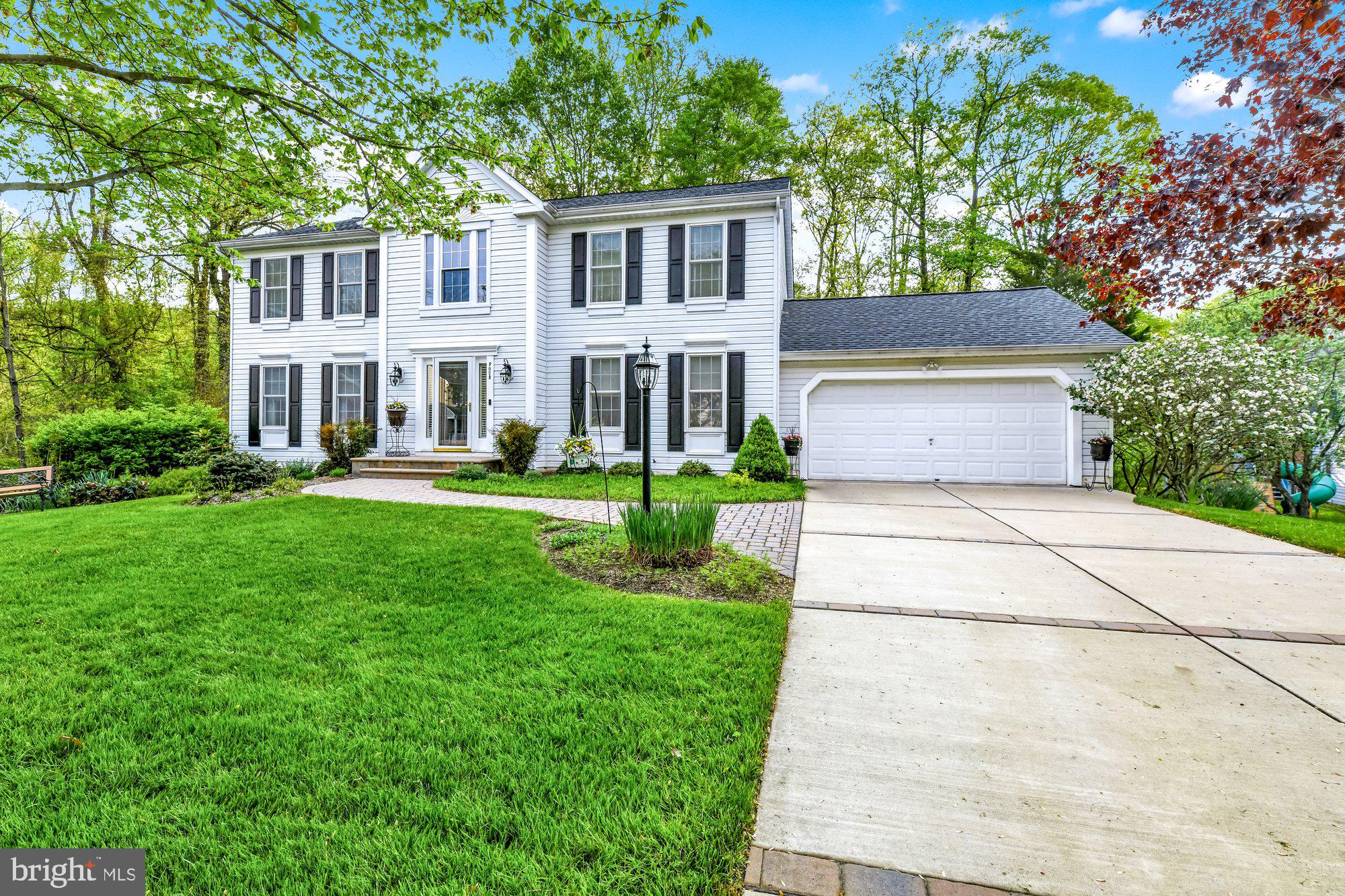 4 Boulder Brook Court Baltimore, MD 21209 - Photo 3 of 49 a front view of a house with garden