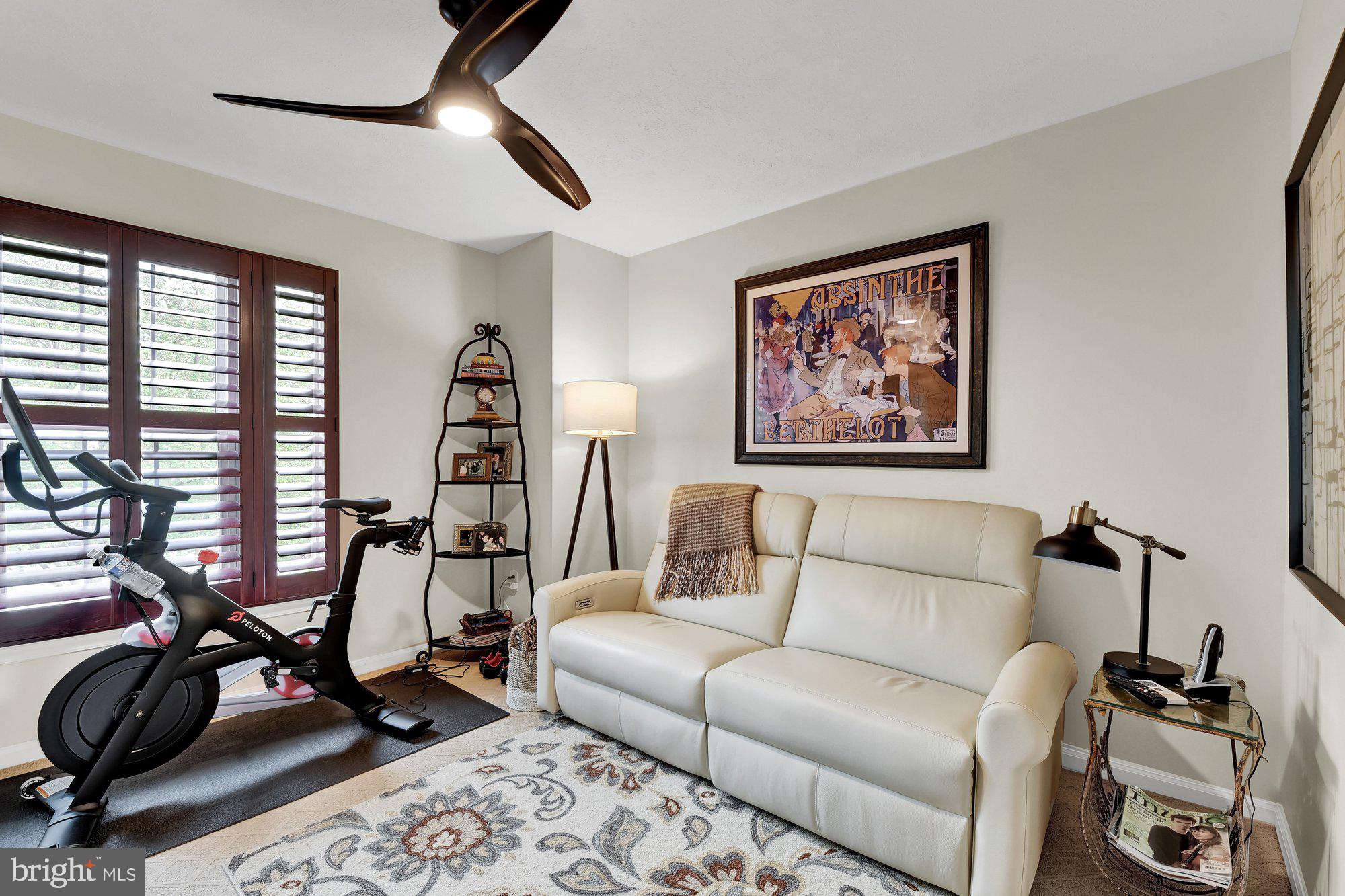 4 Boulder Brook Court Baltimore, MD 21209 - Photo 21 of 49 a living room with furniture and a flat screen tv