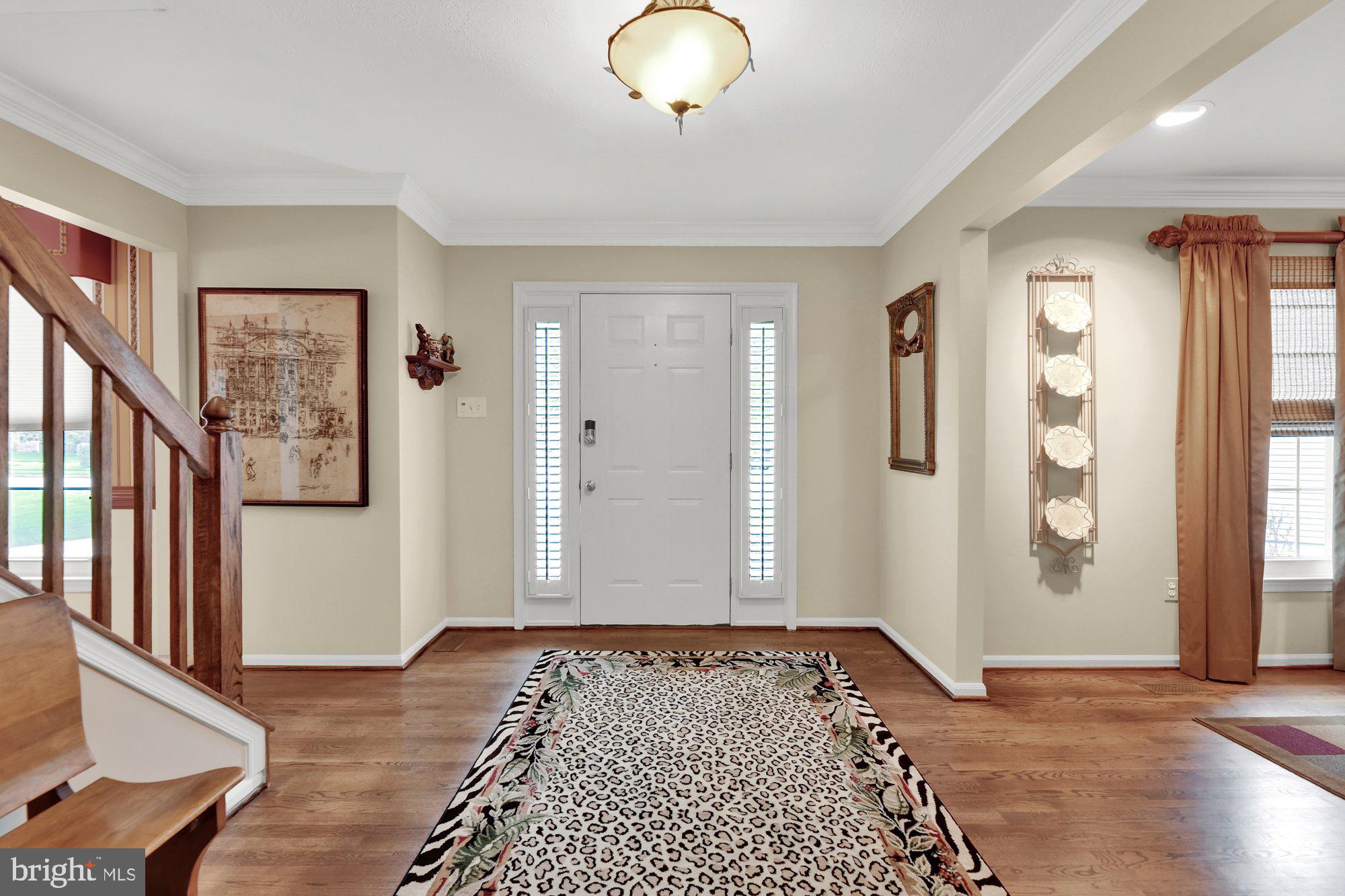 4 Boulder Brook Court Baltimore, MD 21209 - Photo 4 of 49 a view of an entryway with wooden floor