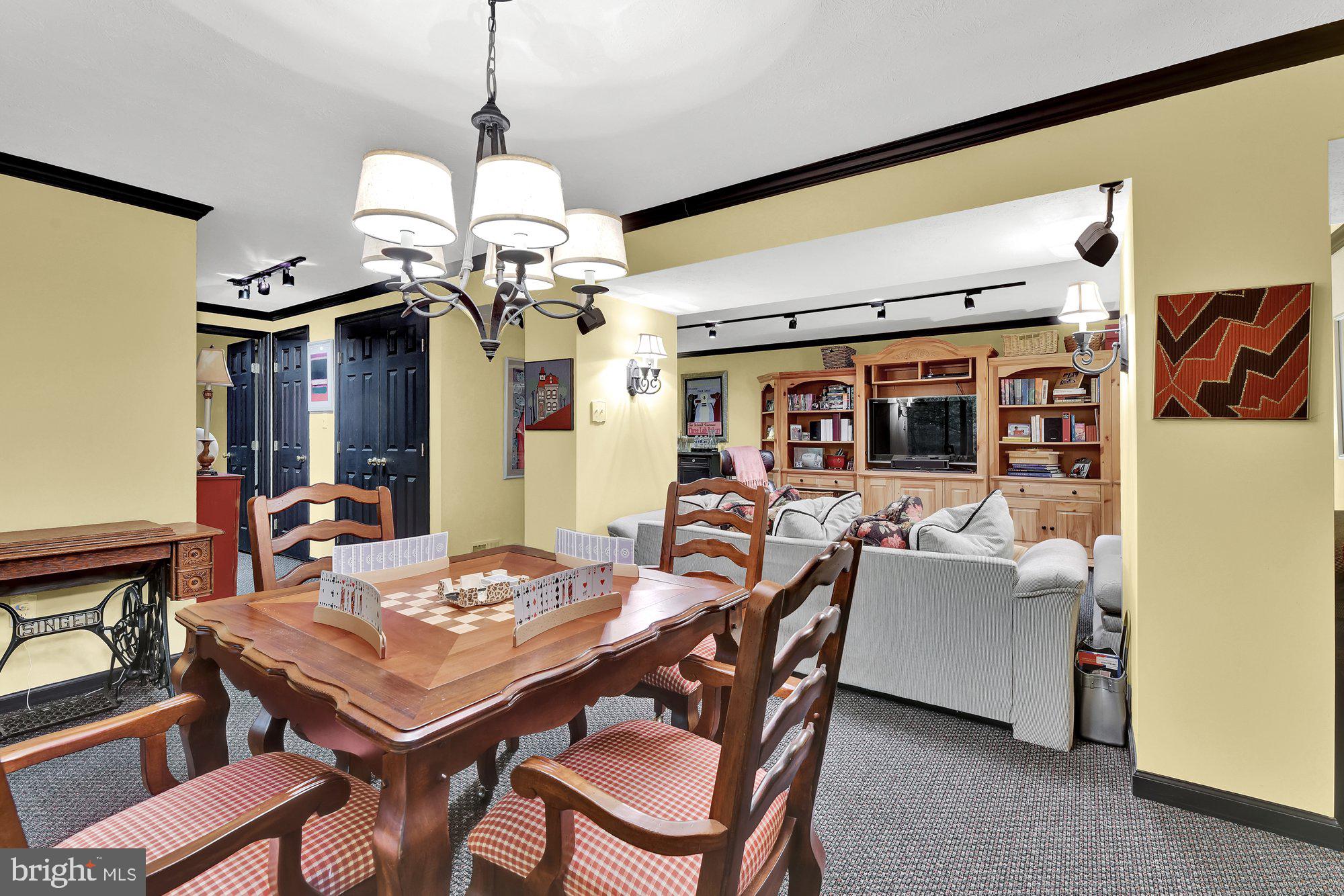 4 Boulder Brook Court Baltimore, MD 21209 - Photo 33 of 49 a view of a dining room with furniture and chandelier