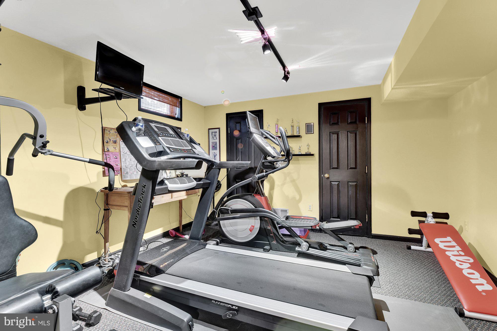 4 Boulder Brook Court Baltimore, MD 21209 - Photo 36 of 49 a view of a room with gym equipment