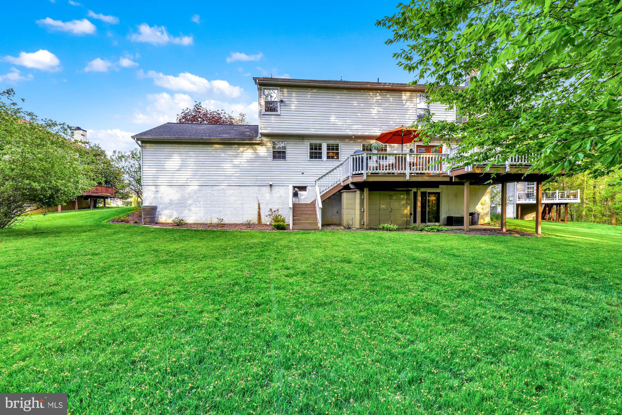 4 Boulder Brook Court Baltimore, MD 21209 - Photo 41 of 49 a view of a house with a yard porch and sitting area