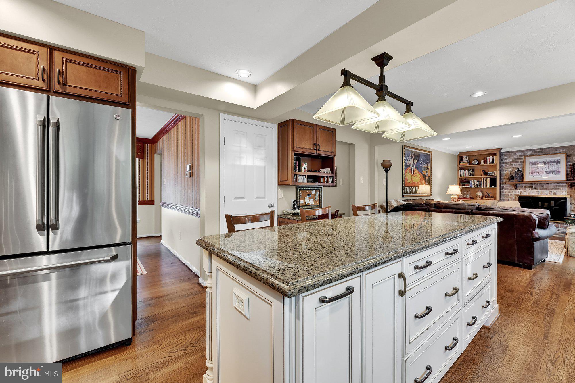 4 Boulder Brook Court Baltimore, MD 21209 - Photo 9 of 49 a kitchen with stainless steel appliances granite countertop a kitchen island a stove and a sink