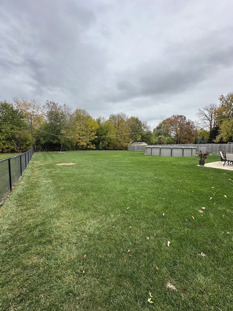 2315 Nan Street Aurora, IL 60502 - Photo 14 of 14 a view of grassy field with mountain