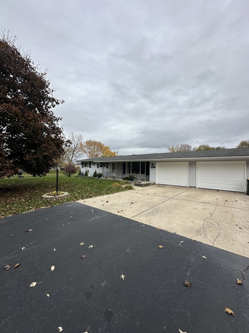 2315 Nan Street Aurora, IL 60502 - Photo 2 of 14 a view of a house with a yard and sitting area
