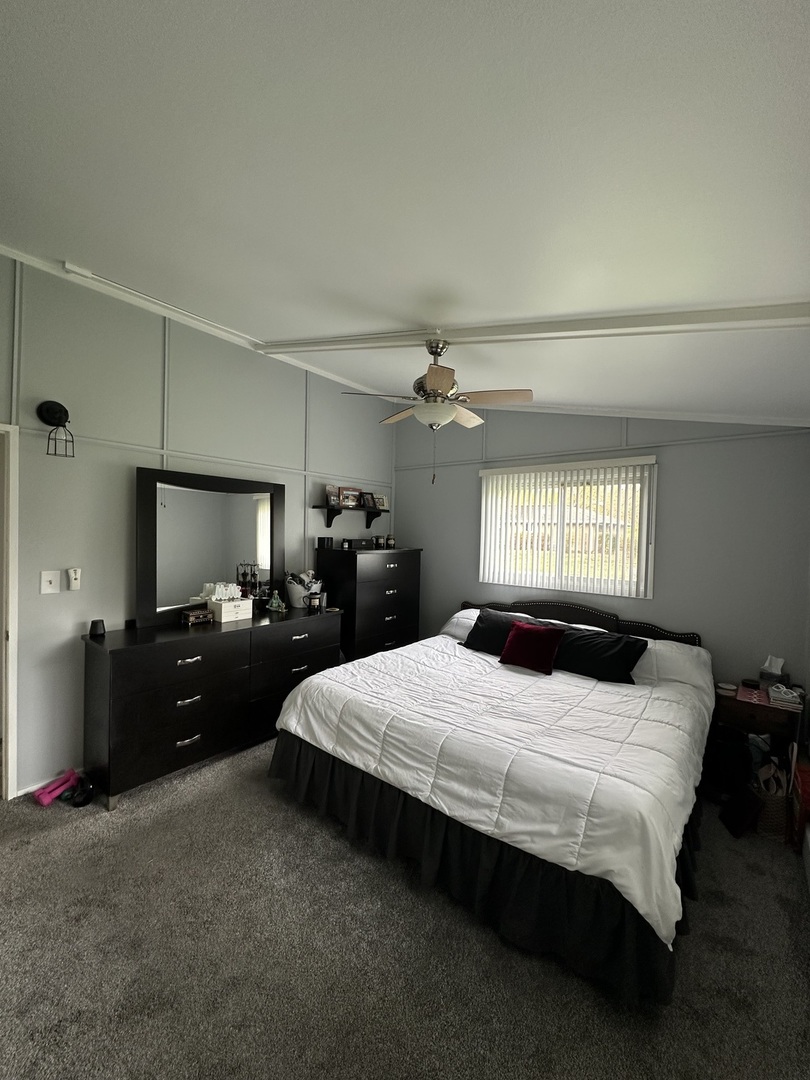 2315 Nan Street Aurora, IL 60502 - Photo 8 of 14 a bedroom with a bed window and dresser