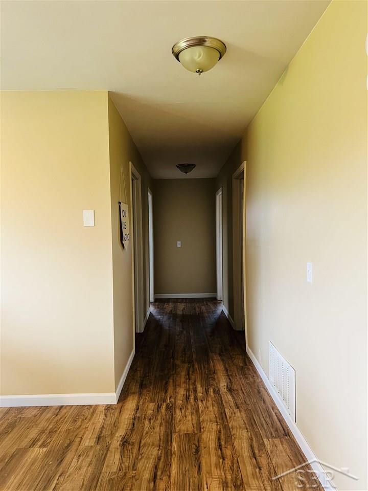 1855 Phelps Lake Road Mayville, MI 48744 - Photo 12 of 31 Hallway to bedrooms and bathrooms
