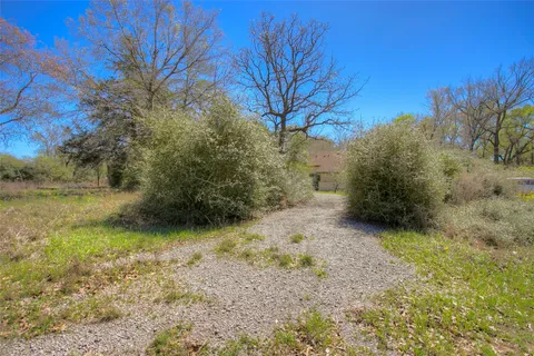 a view of a back yard of the house