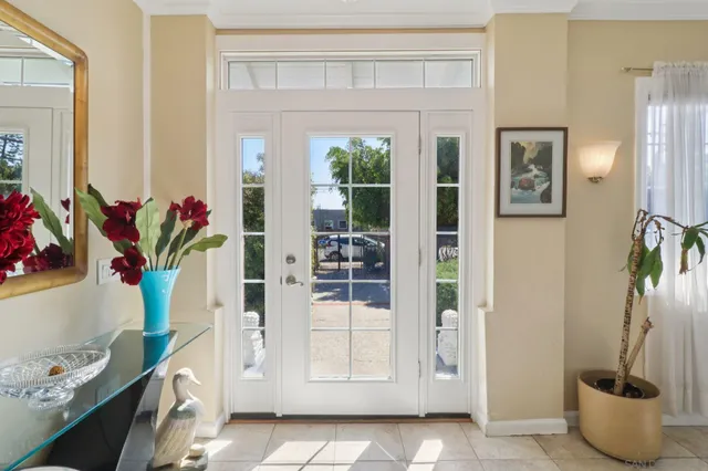 a potted plant sitting on a kitchen table and a potted plant