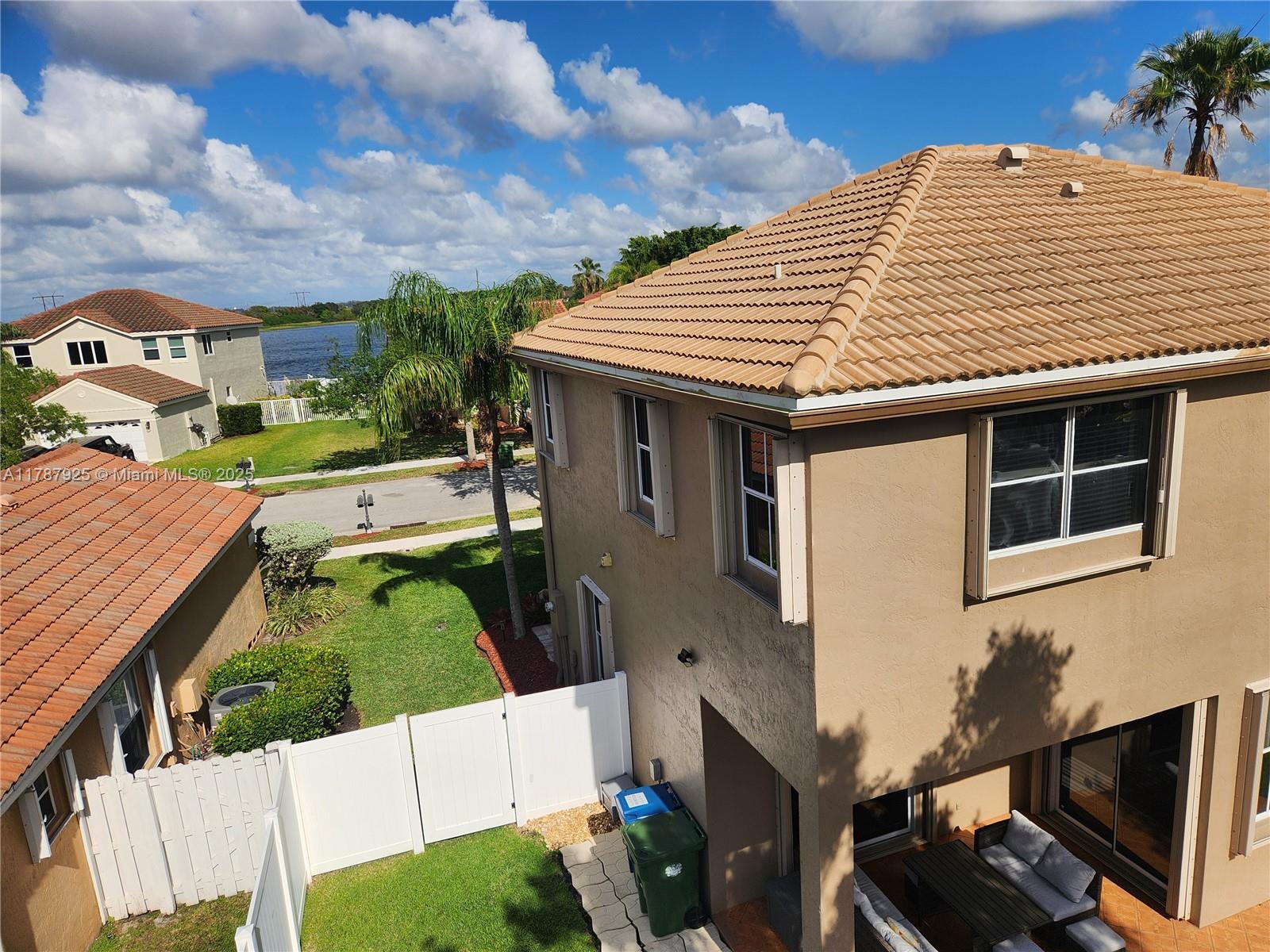 785 Falling Water Road Weston, FL 33326 - Photo 12 of 45 a aerial view of a house with a yard