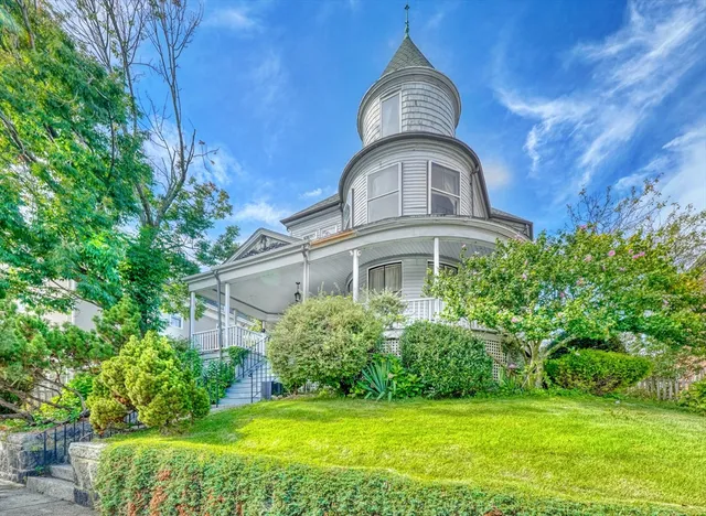 a view of a house with garden