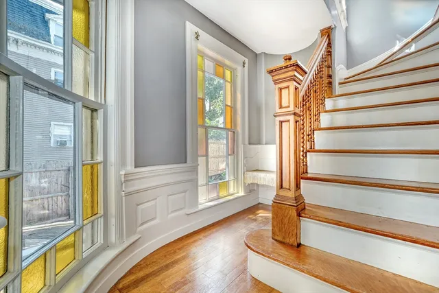 a view of entryway with wooden floor