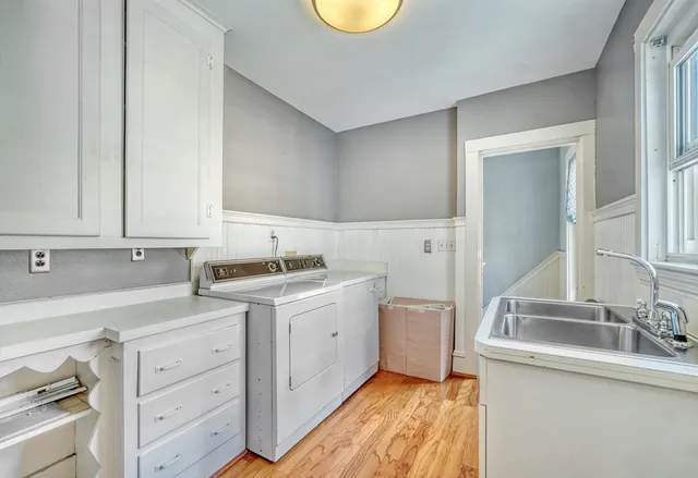 a bedroom with a bed and a cabinets