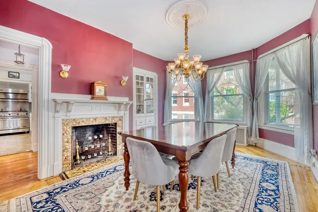 a kitchen with stainless steel appliances granite countertop a stove sink and cabinets