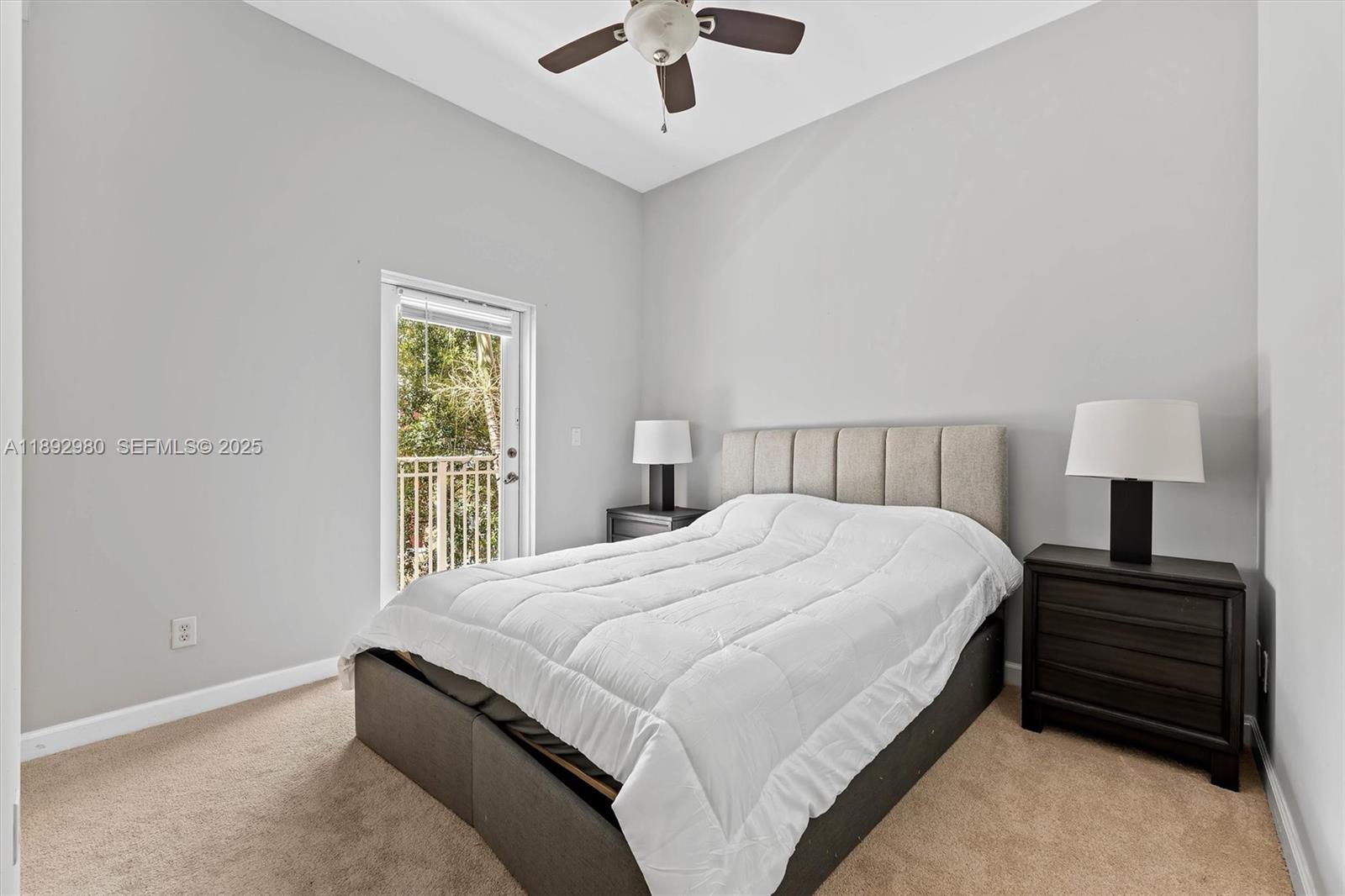 2344 Vintage Drive Lighthouse Point, FL 33064 - Photo 12 of 26 a bedroom with a bed and a window