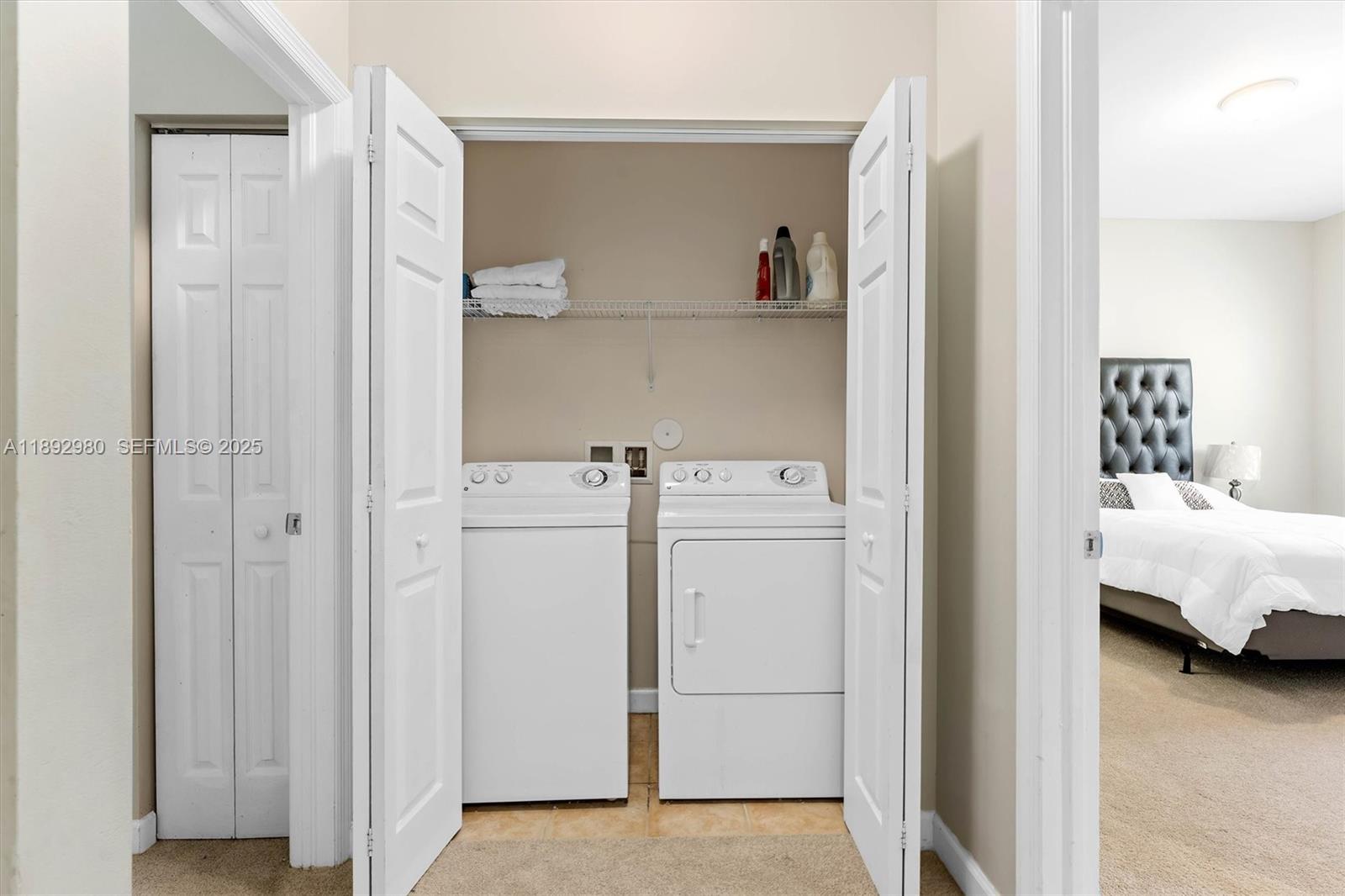 2344 Vintage Drive Lighthouse Point, FL 33064 - Photo 15 of 26 a utility room with dryer and washer