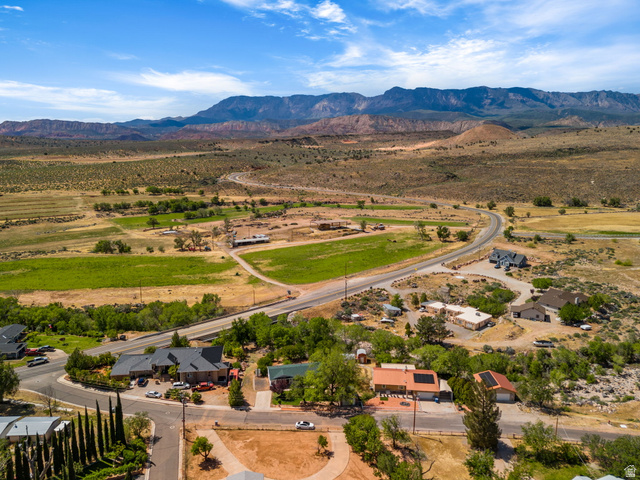 55 Spring Drive Toquerville, UT 84774 - Photo 35 of 36 Aerial view of sparsely populated area featuring a mountain backdrop