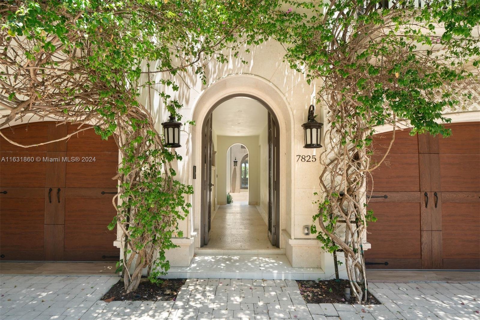 7825 Atlantic Way Miami Beach, FL 33141 - Photo 11 of 33 a front view of a house