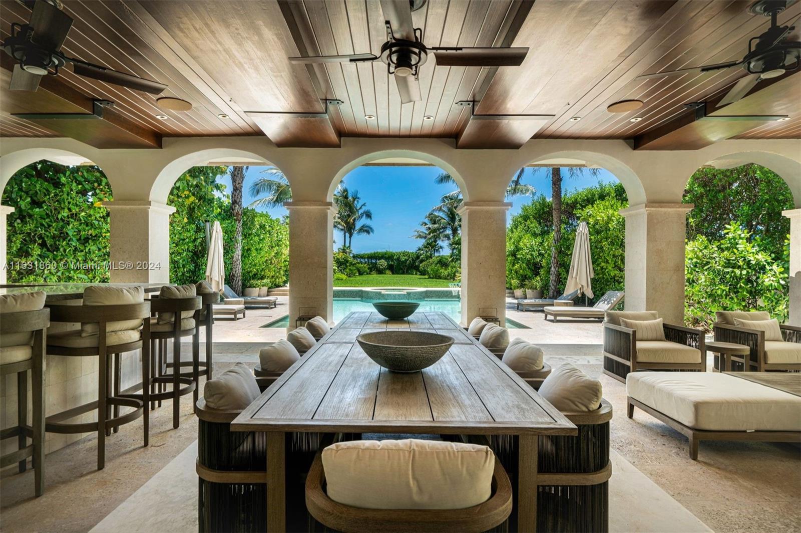 7825 Atlantic Way Miami Beach, FL 33141 - Photo 17 of 33 a view of a dining room with furniture window and outside view