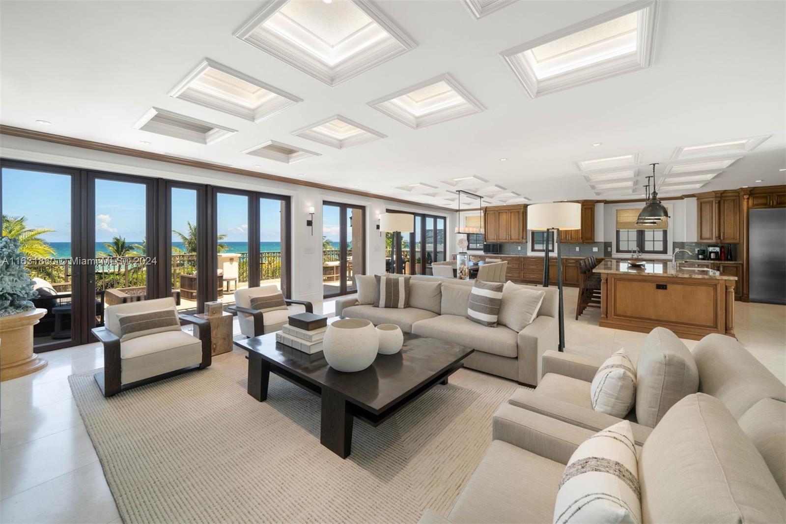 7825 Atlantic Way Miami Beach, FL 33141 - Photo 26 of 33 a living room with furniture and a large window