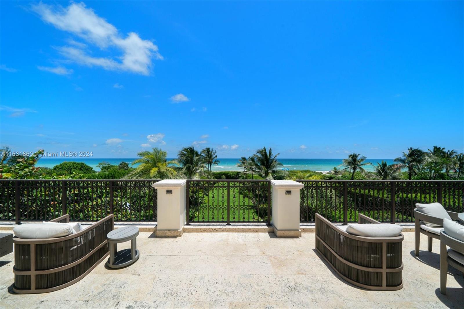 7825 Atlantic Way Miami Beach, FL 33141 - Photo 6 of 33 a view of a terrace with couches and sky view