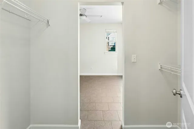 a bathroom with a shower and a sink