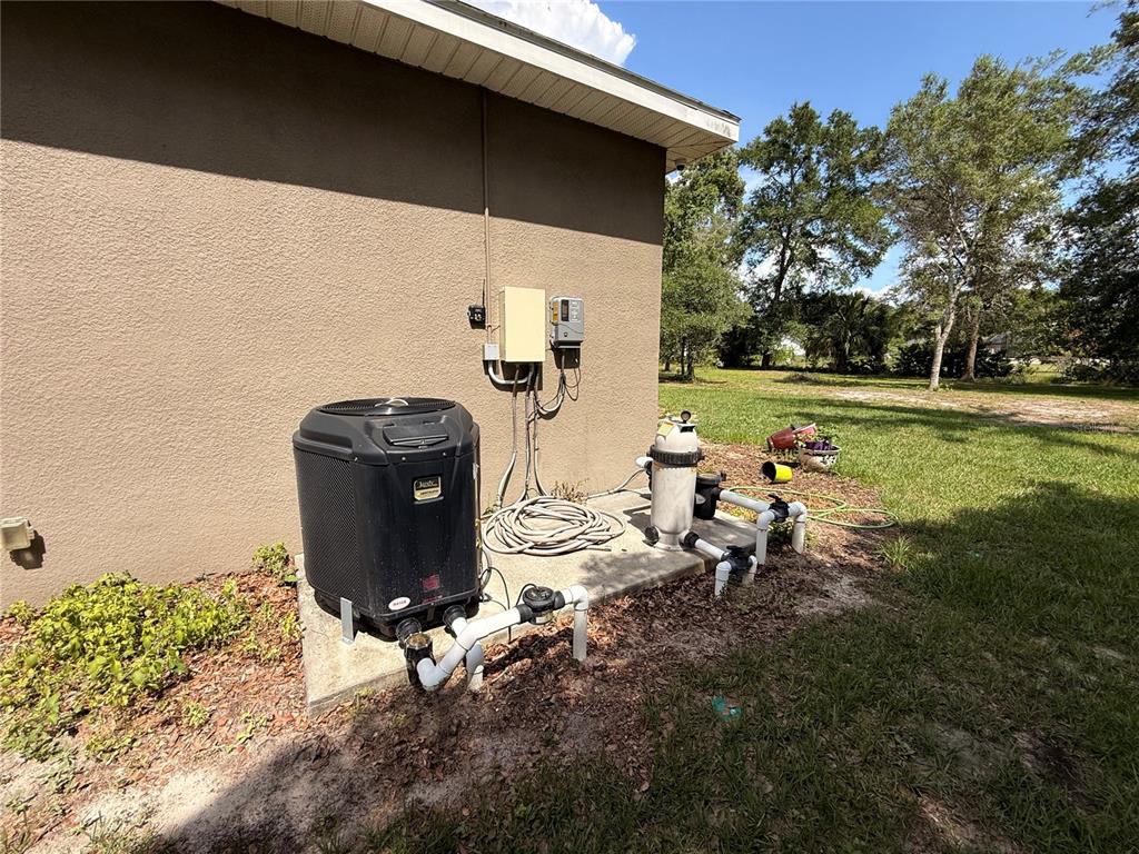 13110 Bamboo Street Spring Hill, FL 34609 - Photo 55 of 56 a view of a backyard with sitting area