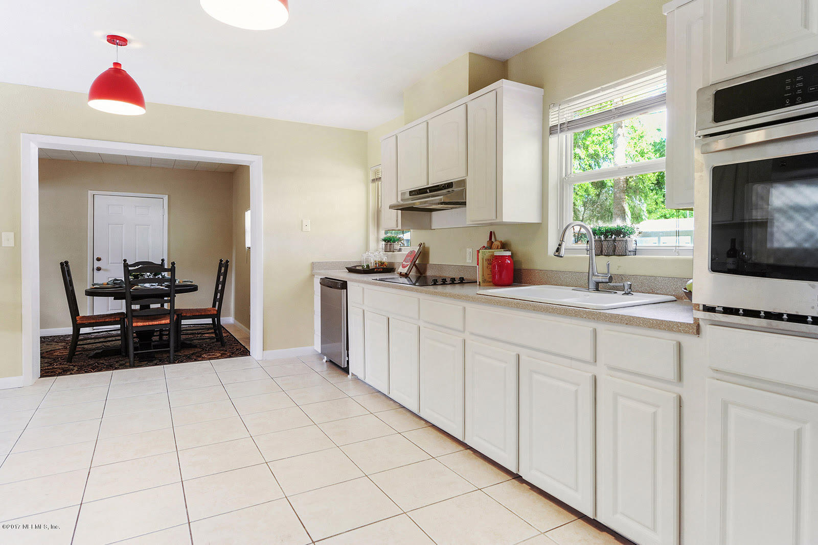1842 Tanglewood Road Jacksonville Beach, FL 32250 - Photo 10 of 28 kitchen into dining room mud room