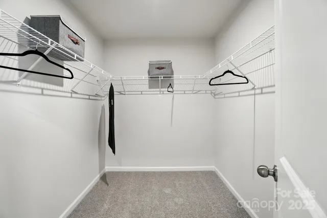 a bathroom with double sink and a mirror