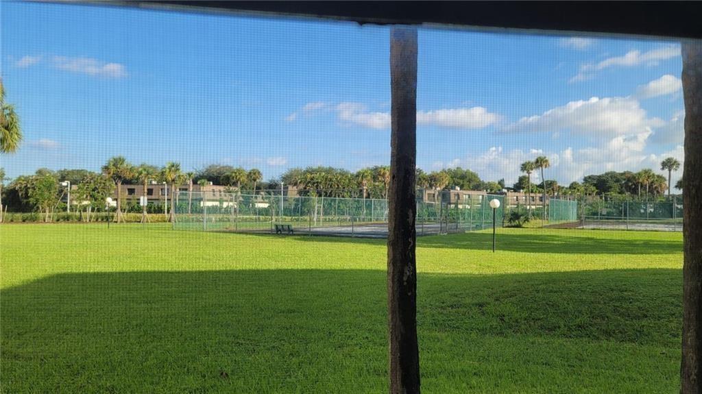 9273 Southwest 8th Street, Unit 109 Boca Raton, FL 33428 - Photo 13 of 22 a view of building with outdoor space