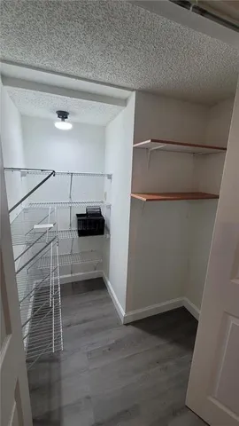 a view of a walk in closet