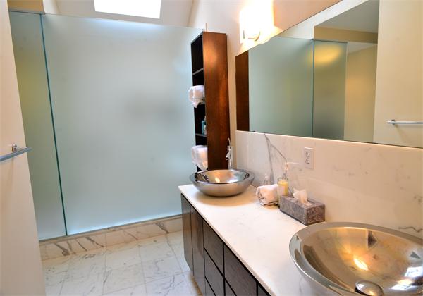 85 Westland Road Weston, MA 02493 - Photo 11 of 16 a bathroom with a granite countertop sink and a mirror