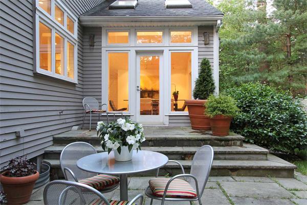 85 Westland Road Weston, MA 02493 - Photo 14 of 16 a outdoor space with a table and chairs