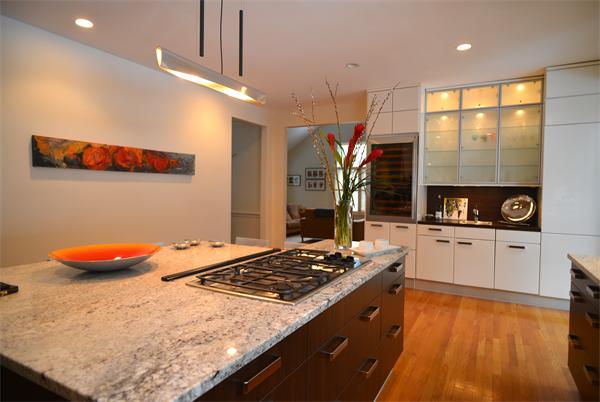 85 Westland Road Weston, MA 02493 - Photo 3 of 16 a kitchen with stainless steel appliances granite countertop a sink stove and refrigerator