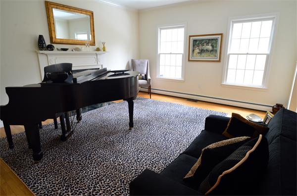 85 Westland Road Weston, MA 02493 - Photo 6 of 16 a living room with furniture and a window