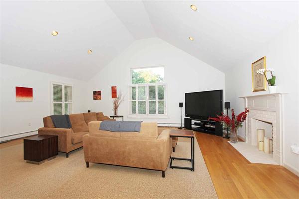 85 Westland Road Weston, MA 02493 - Photo 10 of 16 a living room with furniture and a flat screen tv