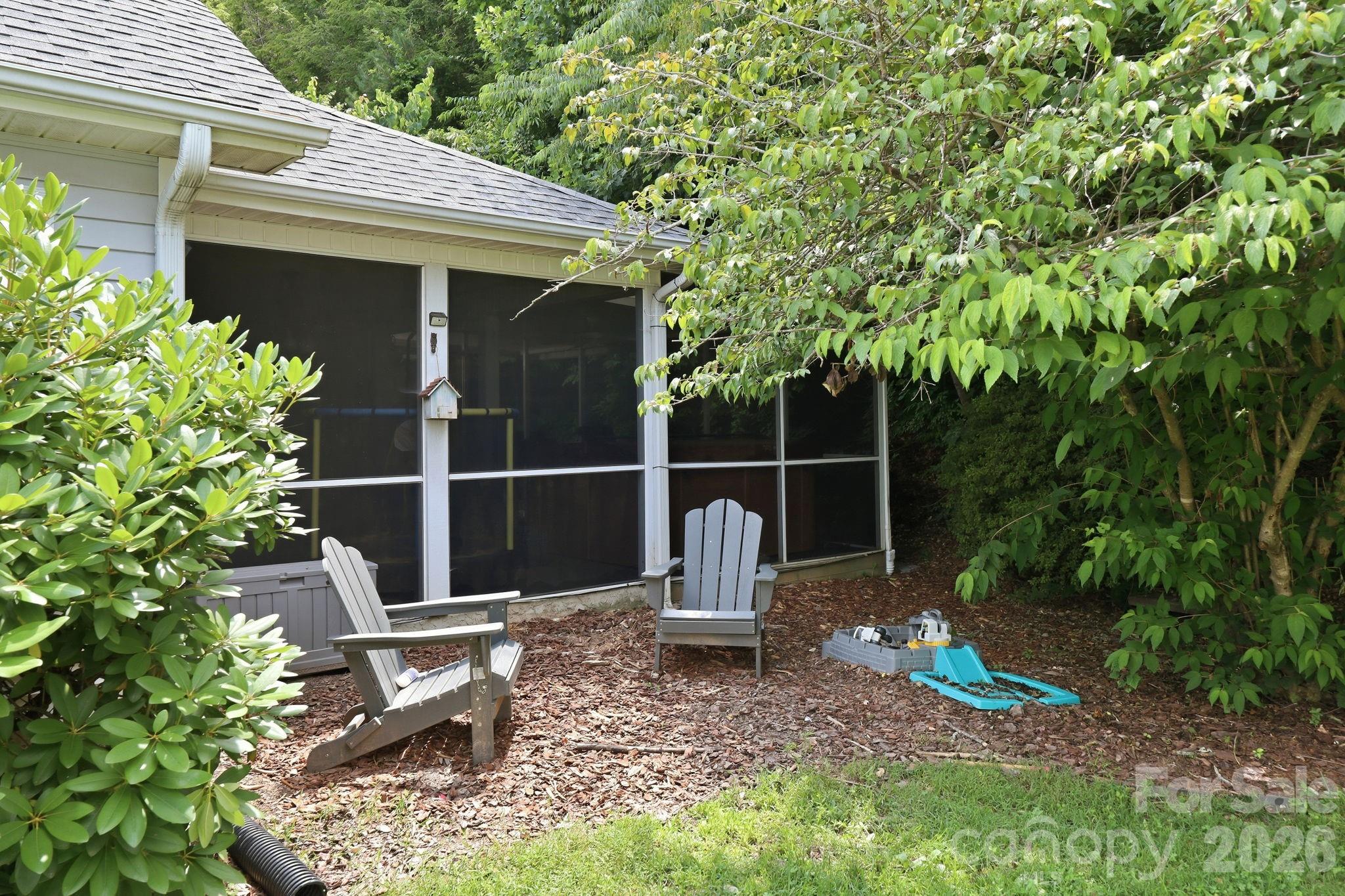51 Sunview Circle Arden, NC 28704 - Photo 23 of 31 a front view of a house with a garden