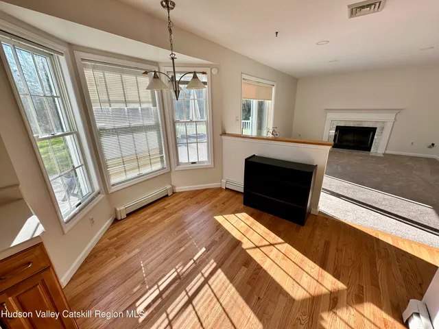 a bathroom with a sink a mirror and a shower