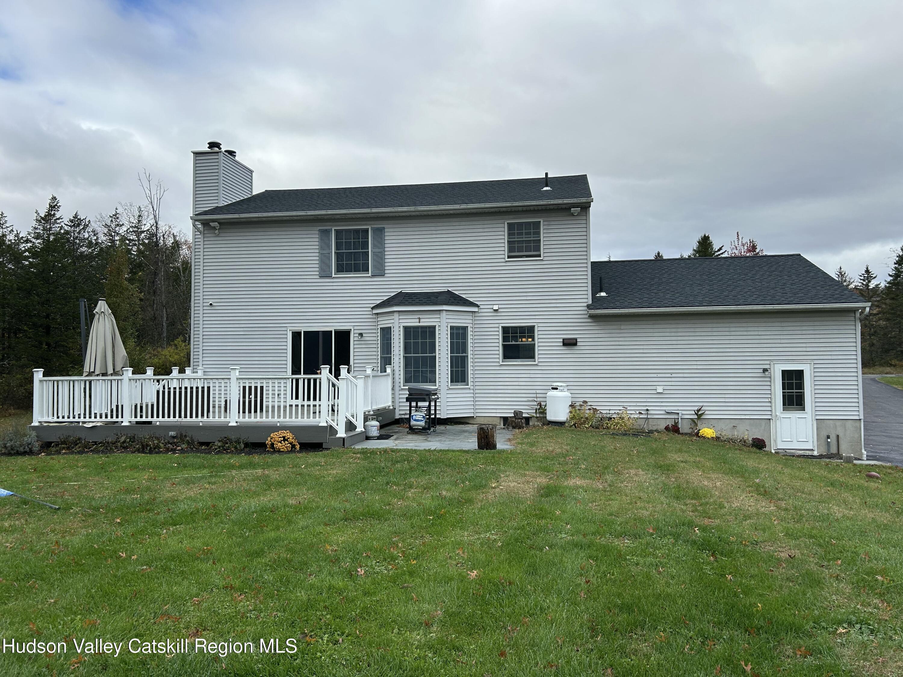 6 High Ridge Road New Paltz, NY 12561 - Photo 3 of 52 a view of a house with a yard and sitting area