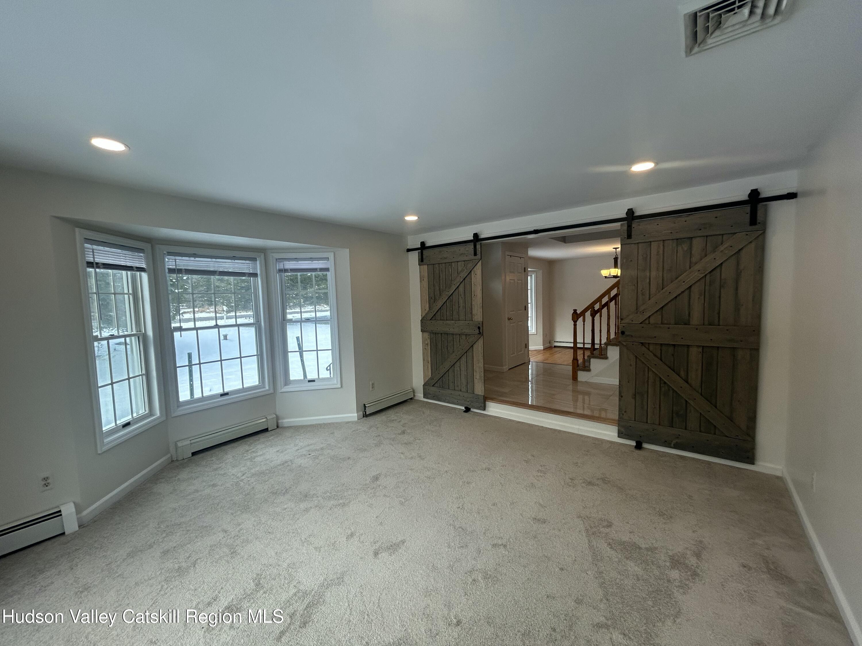 6 High Ridge Road New Paltz, NY 12561 - Photo 34 of 52 a view of an empty room with a window