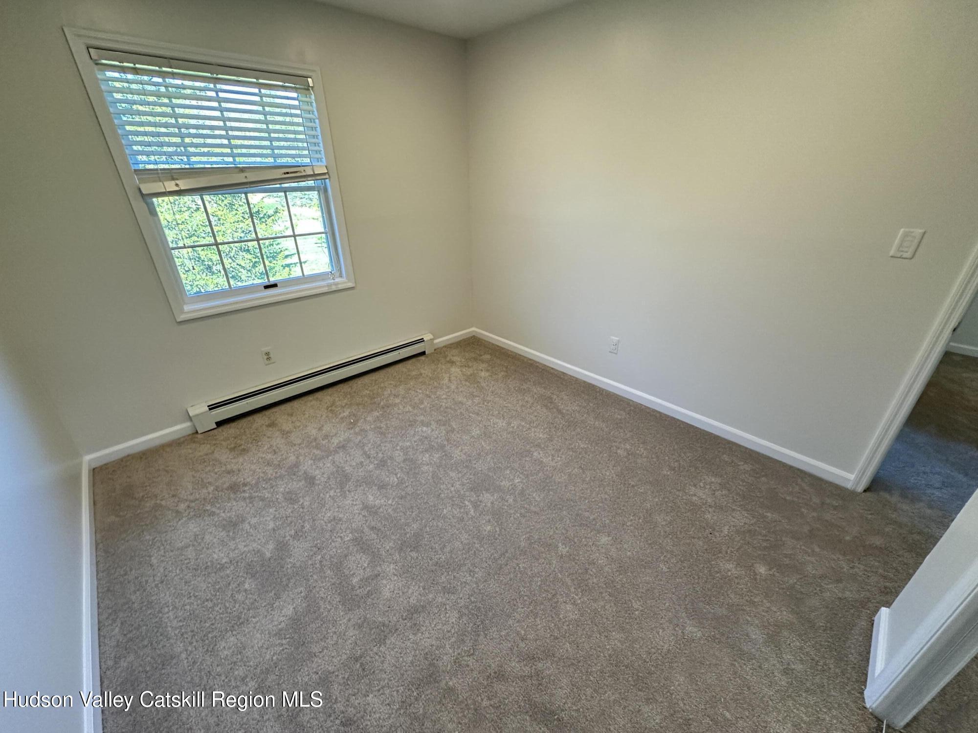 6 High Ridge Road New Paltz, NY 12561 - Photo 45 of 52 an empty room with windows