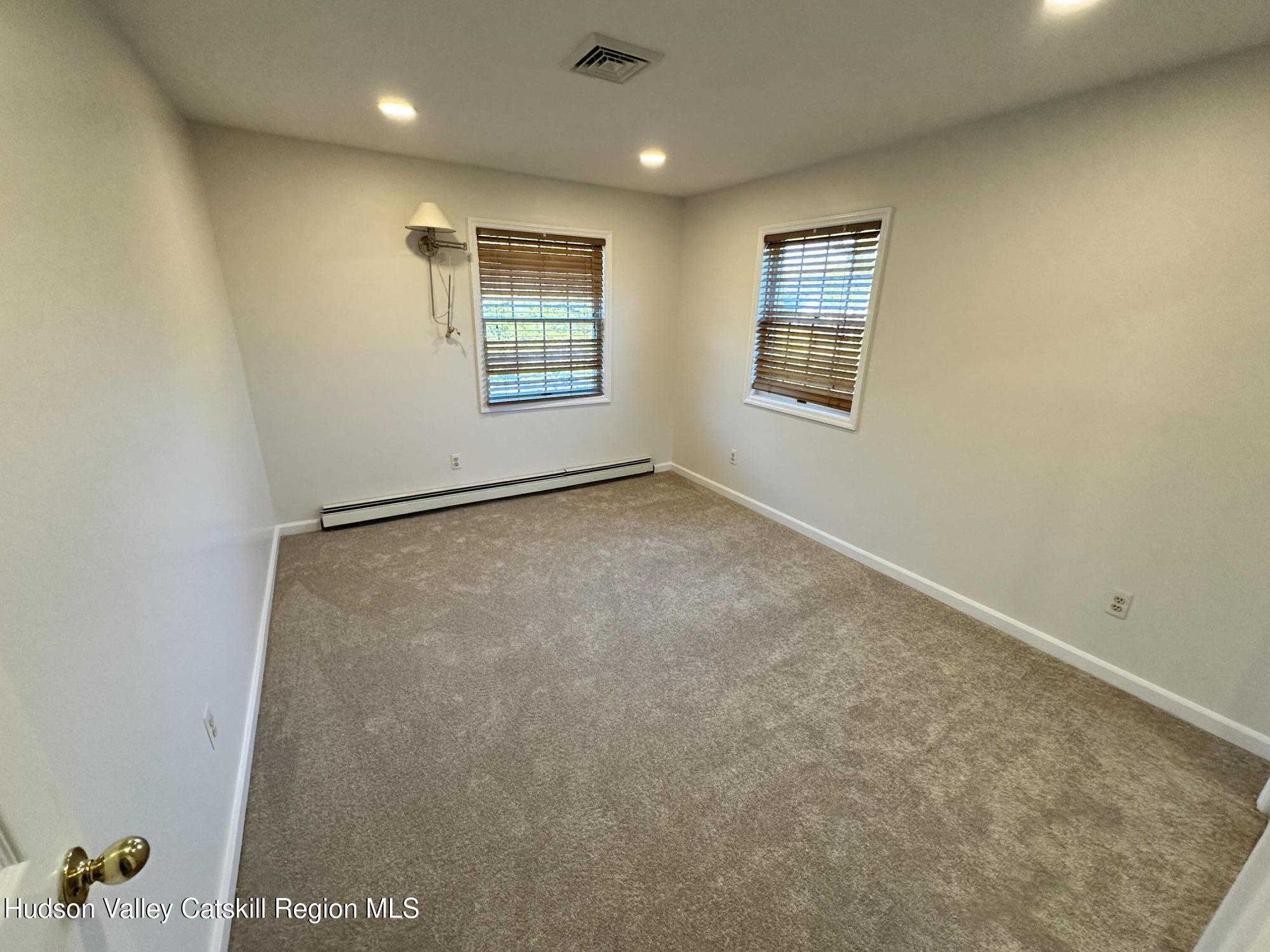 6 High Ridge Road New Paltz, NY 12561 - Photo 47 of 52 an empty room with windows