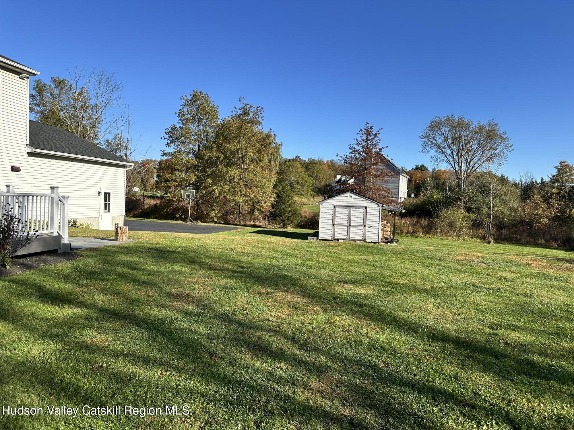 6 High Ridge Road New Paltz, NY 12561 - Photo 9 of 52 a view of a big house with a big yard
